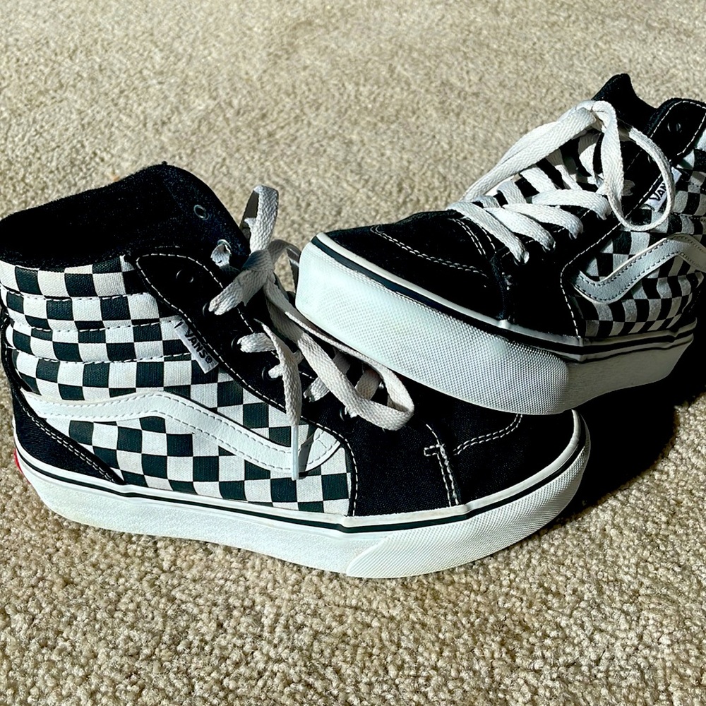 Vans, size 4, unisex skate shoe, black and white checkered. Gently used.